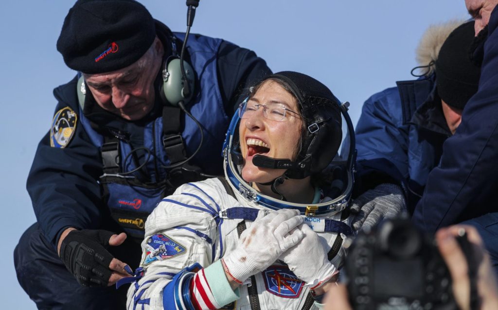 Record-setting astronaut Christina Koch returns to Earth after 328 days