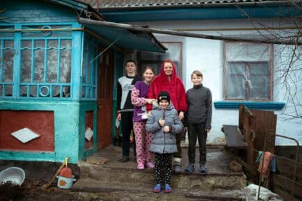 Irina is 36, a former social worker from Kherson, a region south-east of Ukraine, located just above Crimea. Since the escalation of the conflict in February 2022, most of the region has been under Russian control. Most critical infrastructure in the region has been destroyed, including communications, electricity, water, heat, and several bridges. Irina used to look after disadvantaged families, the elderly, and children in her town. Her husband died in 2016 and in 2018 she retired due to a disability. She has five children, three boys and two girls. After fleeing her home, she is now living in a dilapidated wooded house in Vinnytsia region, west-central Ukraine.