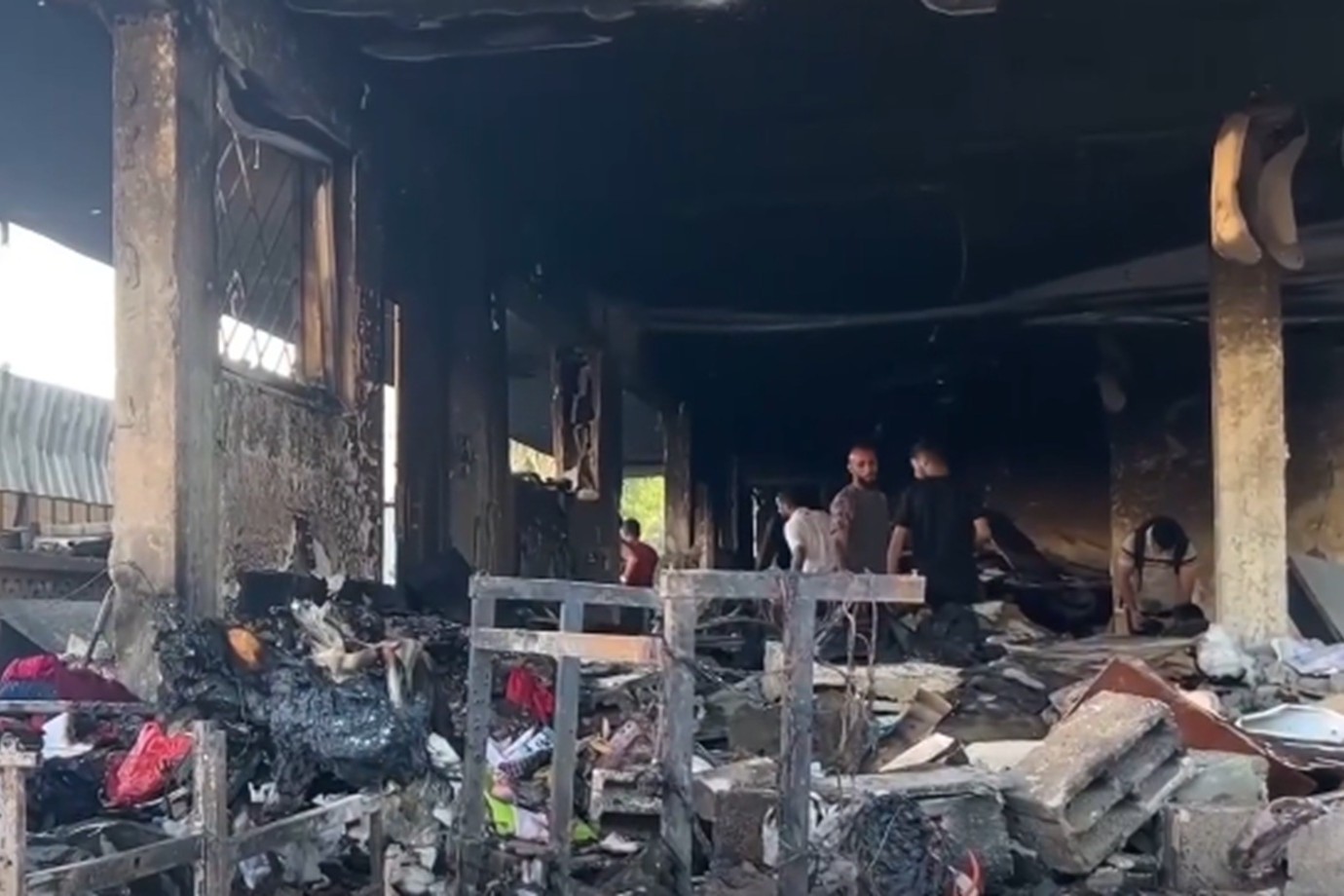 ‘Charred bodies of women and children’: Israeli attacks on Gaza intensify as pressure mounts for ceasefire