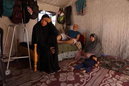 Nearly a quarter of a million women and girls in Gaza are starving. Each day begins with the same desperate question: where will I find food and water? Featured in this photo, Fullah Ziyad Khalil Arafat is responsible for caring and providing for eight people now, including her husband's parents and her five children. Photo: UN Women